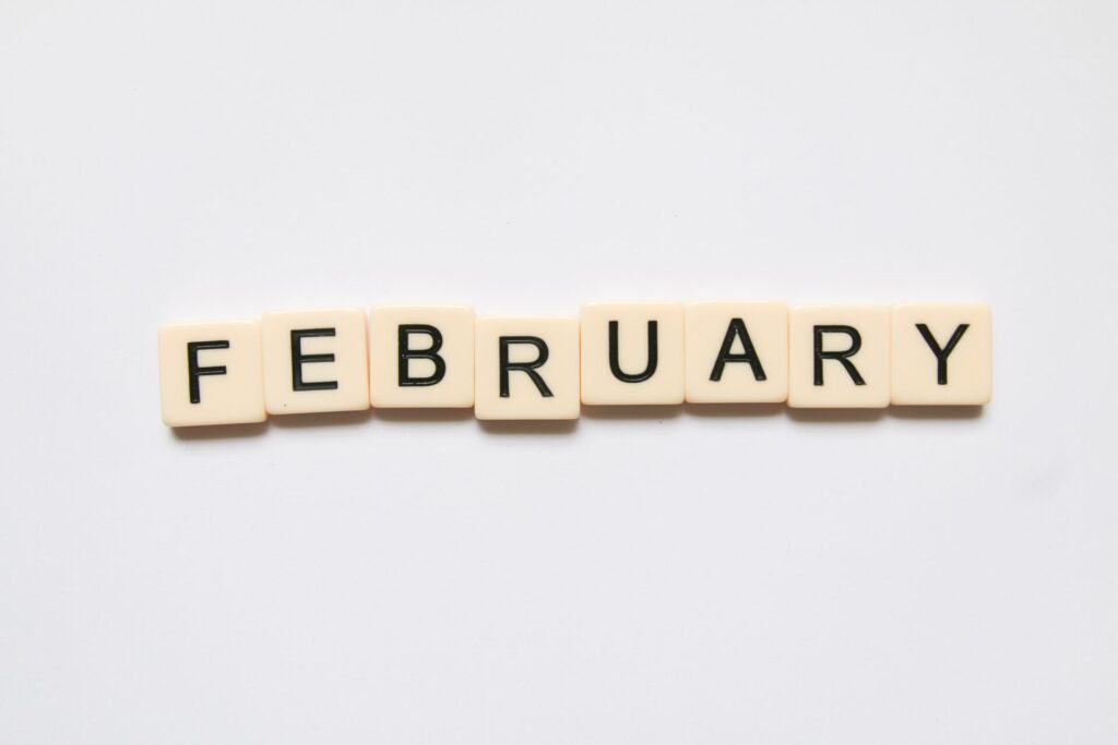 scabble pieces spelling out February